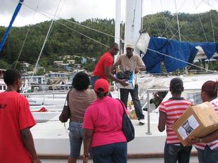 Image #38 - Hurricane Tomas Relief Effort (Carrying the goods to the distribution point)